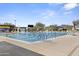 Community lap pool with ample deck space at 41007 N Harbour Town Way, Anthem, AZ 85086