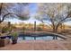 Refreshing swimming pool with waterfall feature at 41007 N Harbour Town Way, Anthem, AZ 85086