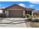Beautiful single-story home with a two-car garage at 42949 N Voyage Trl, Phoenix, AZ 85086