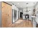 Modern kitchen with stainless steel appliances and a farmhouse sink at 42949 N Voyage Trl, Phoenix, AZ 85086