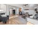 Open living room with hardwood floors and comfortable seating at 42949 N Voyage Trl, Phoenix, AZ 85086