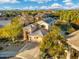 Two-story house with solar panels, desert landscaping, and mountain views at 4516 E Madre Del Oro Dr, Cave Creek, AZ 85331