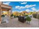 Outdoor patio with seating area and partial view of the house at 4516 E Madre Del Oro Dr, Cave Creek, AZ 85331