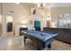 Inviting game room with a pool table and access to the main living area at 4516 E Madre Del Oro Dr, Cave Creek, AZ 85331