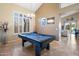 Well-lit game room featuring a pool table, perfect for entertainment at 4516 E Madre Del Oro Dr, Cave Creek, AZ 85331