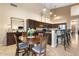Spacious kitchen with granite countertops and dark wood cabinets at 4516 E Madre Del Oro Dr, Cave Creek, AZ 85331