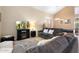 Cozy living room with fireplace, comfortable seating, and a view to the game room at 4516 E Madre Del Oro Dr, Cave Creek, AZ 85331