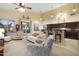 Bright and airy living room with comfortable seating and access to backyard at 4516 E Madre Del Oro Dr, Cave Creek, AZ 85331