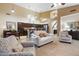 Inviting living room features neutral colors, ample natural light, and comfortable furniture at 4516 E Madre Del Oro Dr, Cave Creek, AZ 85331
