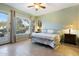 Serene main bedroom with access to the backyard and plenty of natural light at 4516 E Madre Del Oro Dr, Cave Creek, AZ 85331