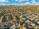 Wide aerial view of the neighborhood and surrounding area at 4516 E Madre Del Oro Dr, Cave Creek, AZ 85331