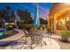 Outdoor patio furniture with a view of the pool and backyard at 4516 E Madre Del Oro Dr, Cave Creek, AZ 85331