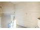 Unfinished laundry room with brick walls and space for appliances at 4720 E Belleview St, Phoenix, AZ 85008