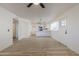 Living room with hardwood floors and open kitchen view at 4720 E Belleview St, Phoenix, AZ 85008