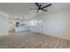 Living room with hardwood floors and open kitchen view at 4720 E Belleview St, Phoenix, AZ 85008
