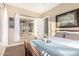 Bedroom with window seat and wood bed frame at 4811 E Patrick Ln, Phoenix, AZ 85054