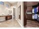 Elegant bathroom with double vanity and walk-in closet at 4811 E Patrick Ln, Phoenix, AZ 85054