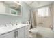 Bathroom with tub and white vanity at 5241 E Lindstrom Ln, Mesa, AZ 85215