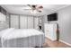 Main bedroom with a large bed and plenty of closet space at 5241 E Lindstrom Ln, Mesa, AZ 85215