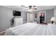 Bedroom with a ceiling fan and large bed at 5241 E Lindstrom Ln, Mesa, AZ 85215