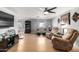 Spacious living room featuring comfortable seating and hardwood floors at 5241 E Lindstrom Ln, Mesa, AZ 85215