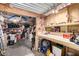 Well-equipped workshop featuring ample storage and workbenches at 5241 E Lindstrom Ln, Mesa, AZ 85215