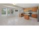 Kitchen with island, granite counters and wood cabinets at 6131 W Irma Ln, Glendale, AZ 85308