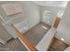 High-ceilinged living room with tile and carpeted floors, and multiple windows at 6131 W Irma Ln, Glendale, AZ 85308