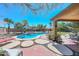 Inviting kidney-shaped pool with surrounding patio at 6603 W Harwell Rd, Laveen, AZ 85339