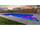 Swimming pool with blue lighting at dusk at 7438 W Jasmine Trl, Peoria, AZ 85383