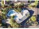 Bird's eye view of a sprawling home with a pool and landscaping at 7760 E Carefree Dr, Carefree, AZ 85377