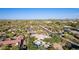Aerial view of a single-story home with pool and mountain views at 7760 E Carefree Dr, Carefree, AZ 85377