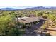 Single story home with mountain views and a long private driveway at 7760 E Carefree Dr, Carefree, AZ 85377