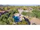 Aerial view showing home, pool, and desert landscape at 7760 E Carefree Dr, Carefree, AZ 85377
