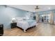 Bright and spacious bedroom with light blue walls and wood floors at 7760 E Carefree Dr, Carefree, AZ 85377