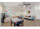 Bedroom with built-in air hockey table and colorful wall at 7760 E Carefree Dr, Carefree, AZ 85377