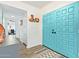 Entryway with teal double doors and tile flooring at 7760 E Carefree Dr, Carefree, AZ 85377