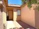 Inviting front porch features a tiled walkway and well-maintained facade, showcasing the home's curb appeal at 8014 E Plata Ave, Mesa, AZ 85212