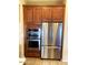 The kitchen features a stainless steel refrigerator and built-in oven at 8014 E Plata Ave, Mesa, AZ 85212
