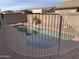 Sparkling pool with a fenced perimeter, ideal for outdoor enjoyment at 8014 E Plata Ave, Mesa, AZ 85212