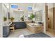 Modern bathroom with a soaking tub, walk-in shower, and dark blue vanities at 8040 E Laurel St, Mesa, AZ 85207