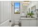 Well-lit bathroom with a shower/tub combo and modern vanity at 8040 E Laurel St, Mesa, AZ 85207