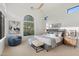Bright bedroom with a king-size bed and large window at 8040 E Laurel St, Mesa, AZ 85207