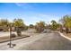 Gated community entrance with stone pillars and landscaping at 8040 E Laurel St, Mesa, AZ 85207