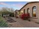 Elegant home entrance with landscaped walkway at 8040 E Laurel St, Mesa, AZ 85207