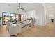 Open concept living area with comfortable seating and kitchen views at 8040 E Laurel St, Mesa, AZ 85207