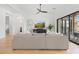 Light and airy living room with sectional sofa and view of backyard at 8040 E Laurel St, Mesa, AZ 85207