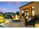 Cozy fire pit and seating area on the patio at 8040 E Laurel St, Mesa, AZ 85207
