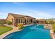 Luxury pool and spa with outdoor kitchen and gazebo at 8040 E Laurel St, Mesa, AZ 85207