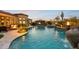 Expansive pool with a built-in bar and fire pit at 8040 E Laurel St, Mesa, AZ 85207